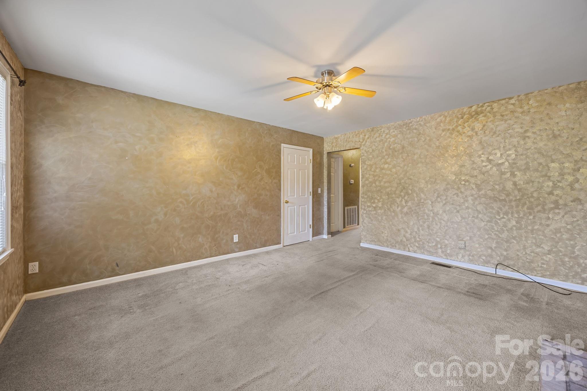 1311 Jenkins Road Gastonia, NC 28052 - Photo 13 of 47 a view of an empty room with a window