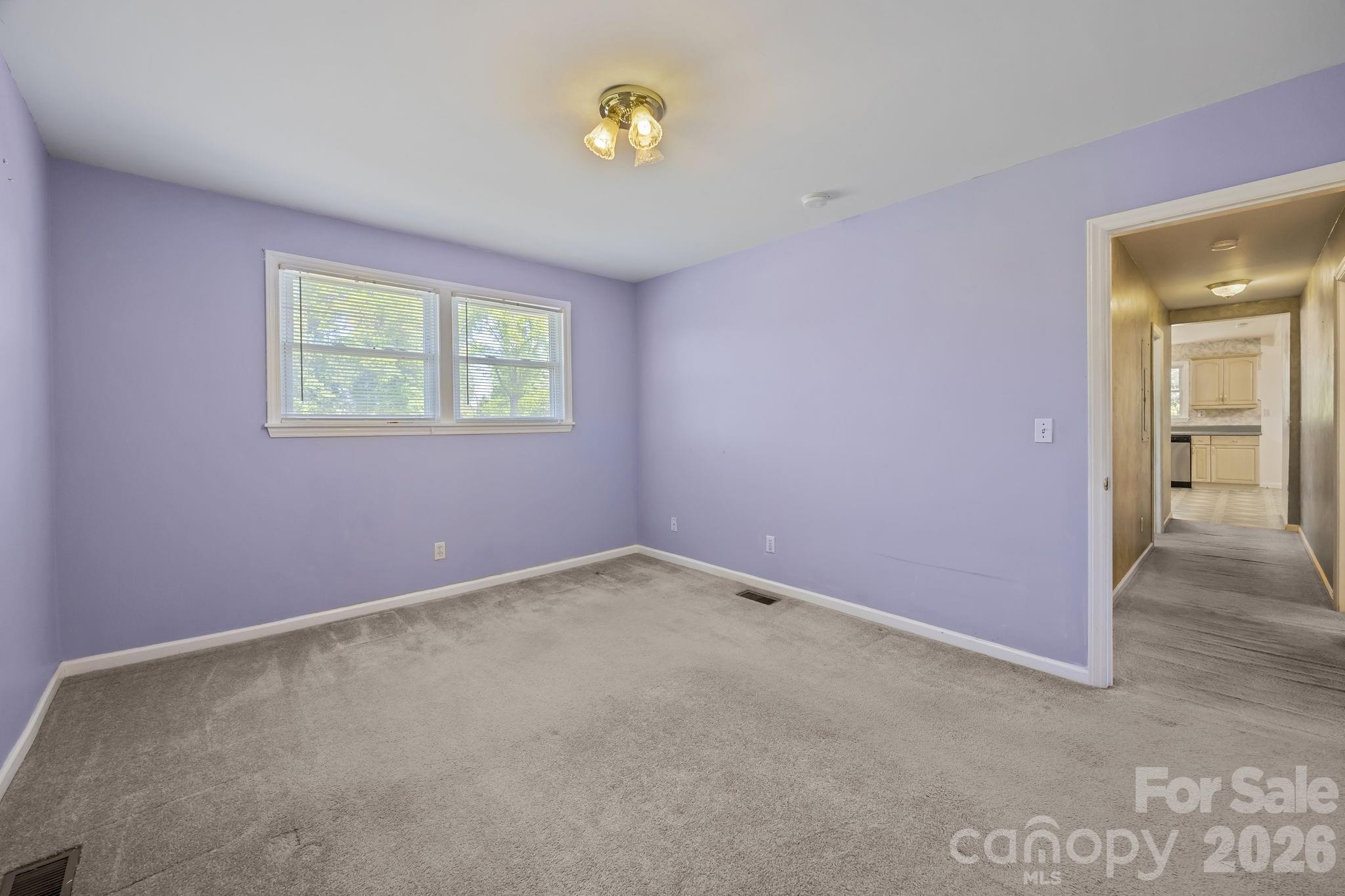 1311 Jenkins Road Gastonia, NC 28052 - Photo 17 of 47 an empty room with windows