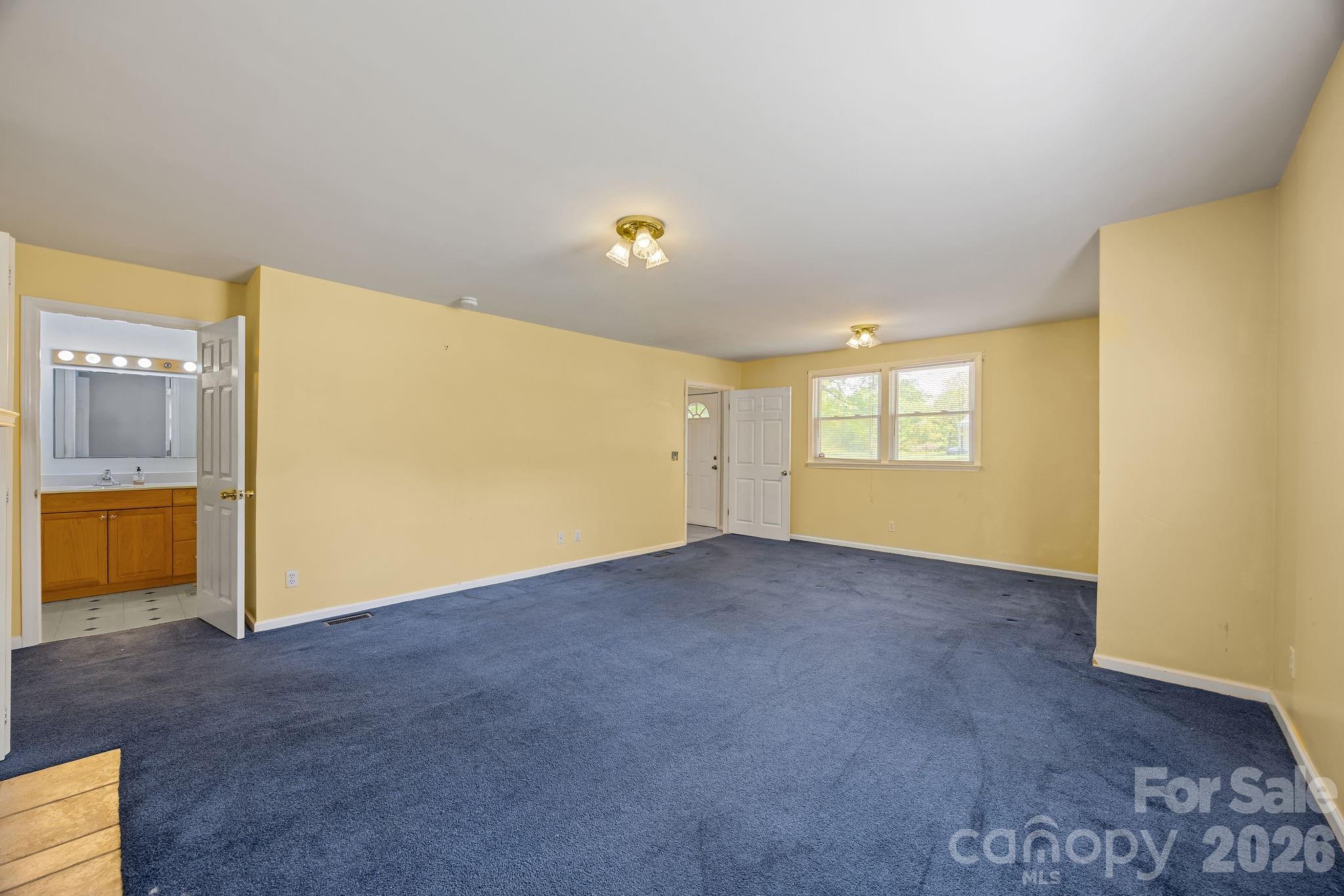 1311 Jenkins Road Gastonia, NC 28052 - Photo 28 of 47 a view of an empty room with a window