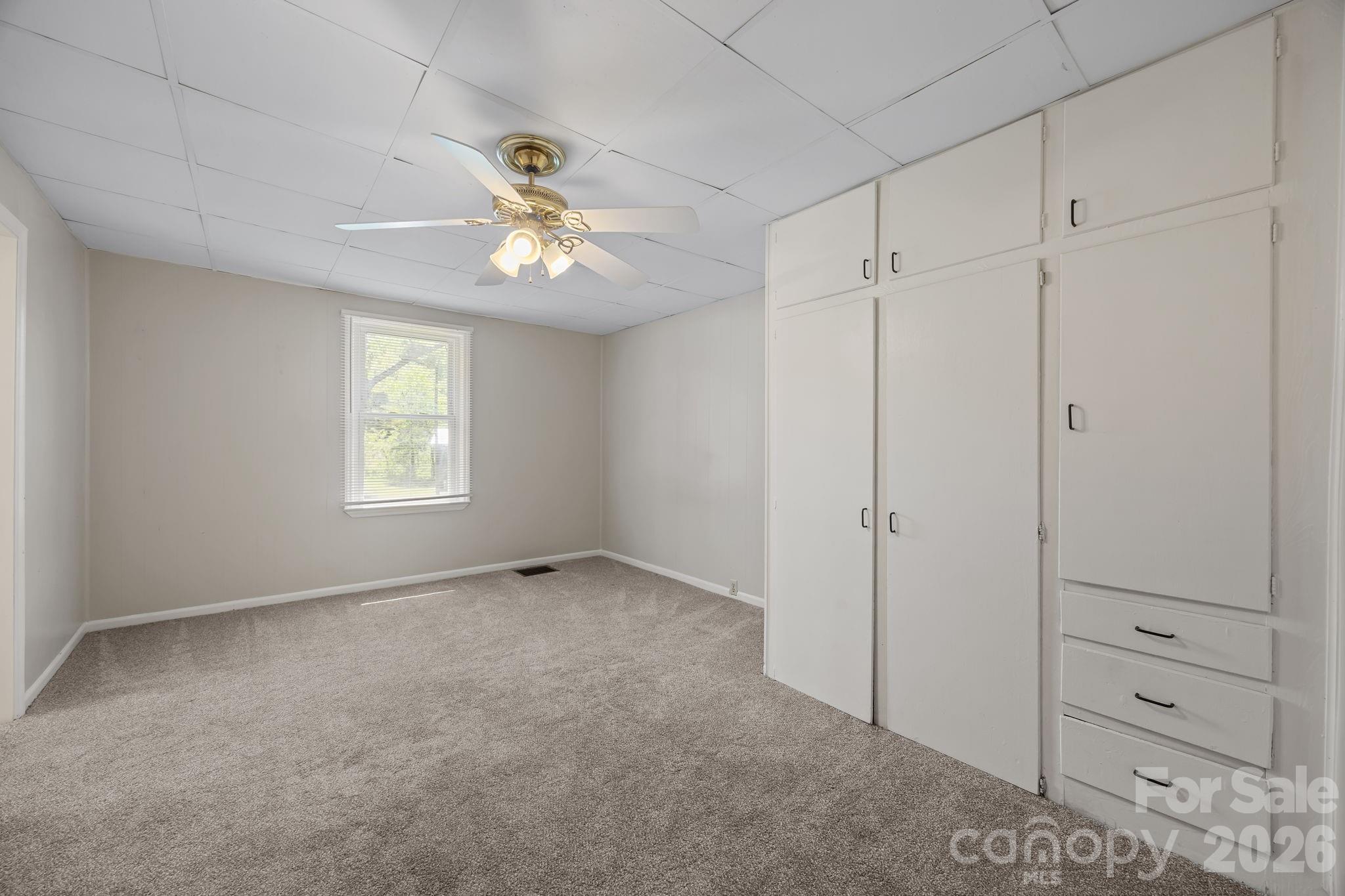 1311 Jenkins Road Gastonia, NC 28052 - Photo 37 of 47 a view of an empty room with a window