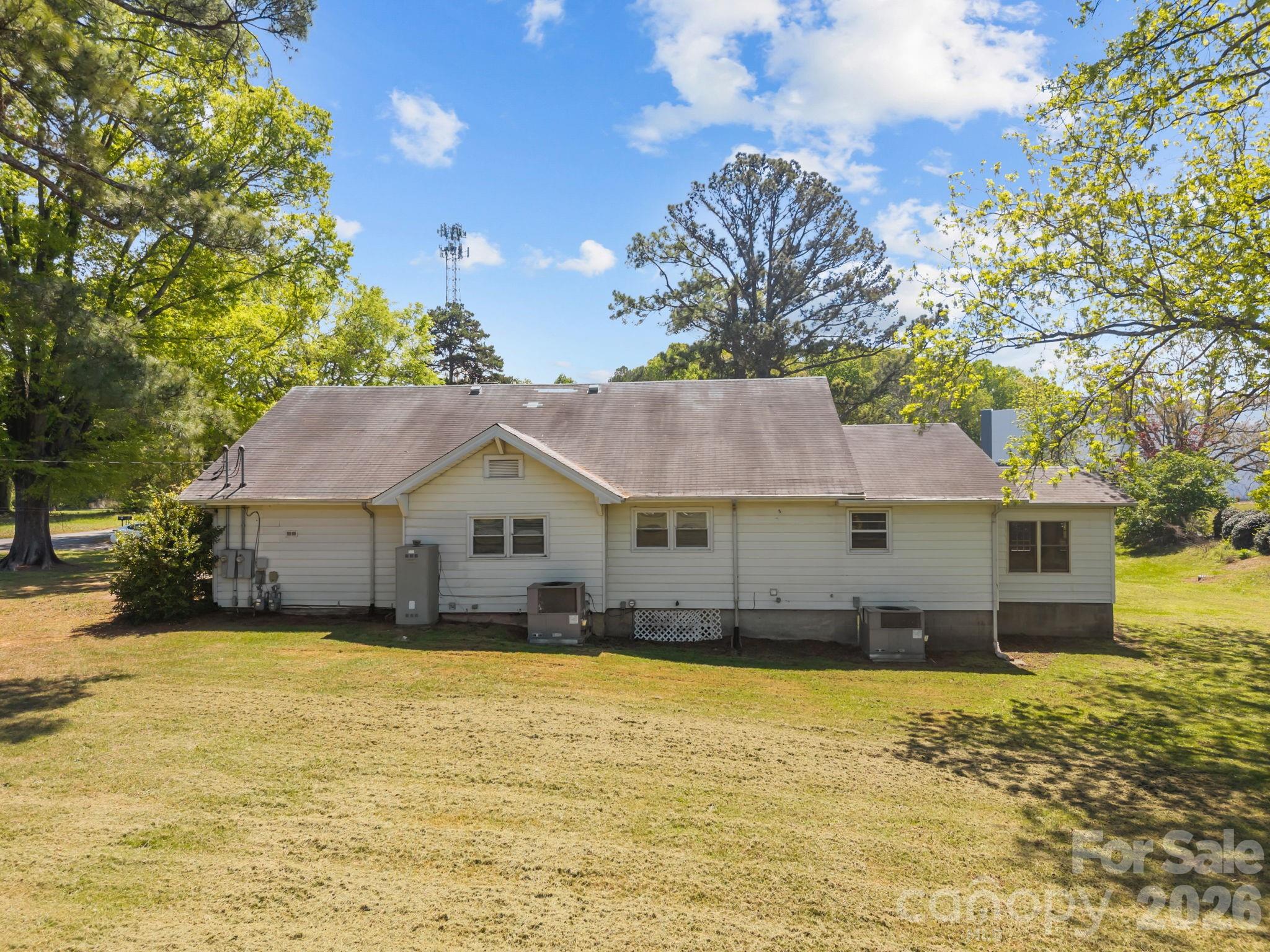 1311 Jenkins Road Gastonia, NC 28052 - Photo 4 of 47 a house view with a garden space
