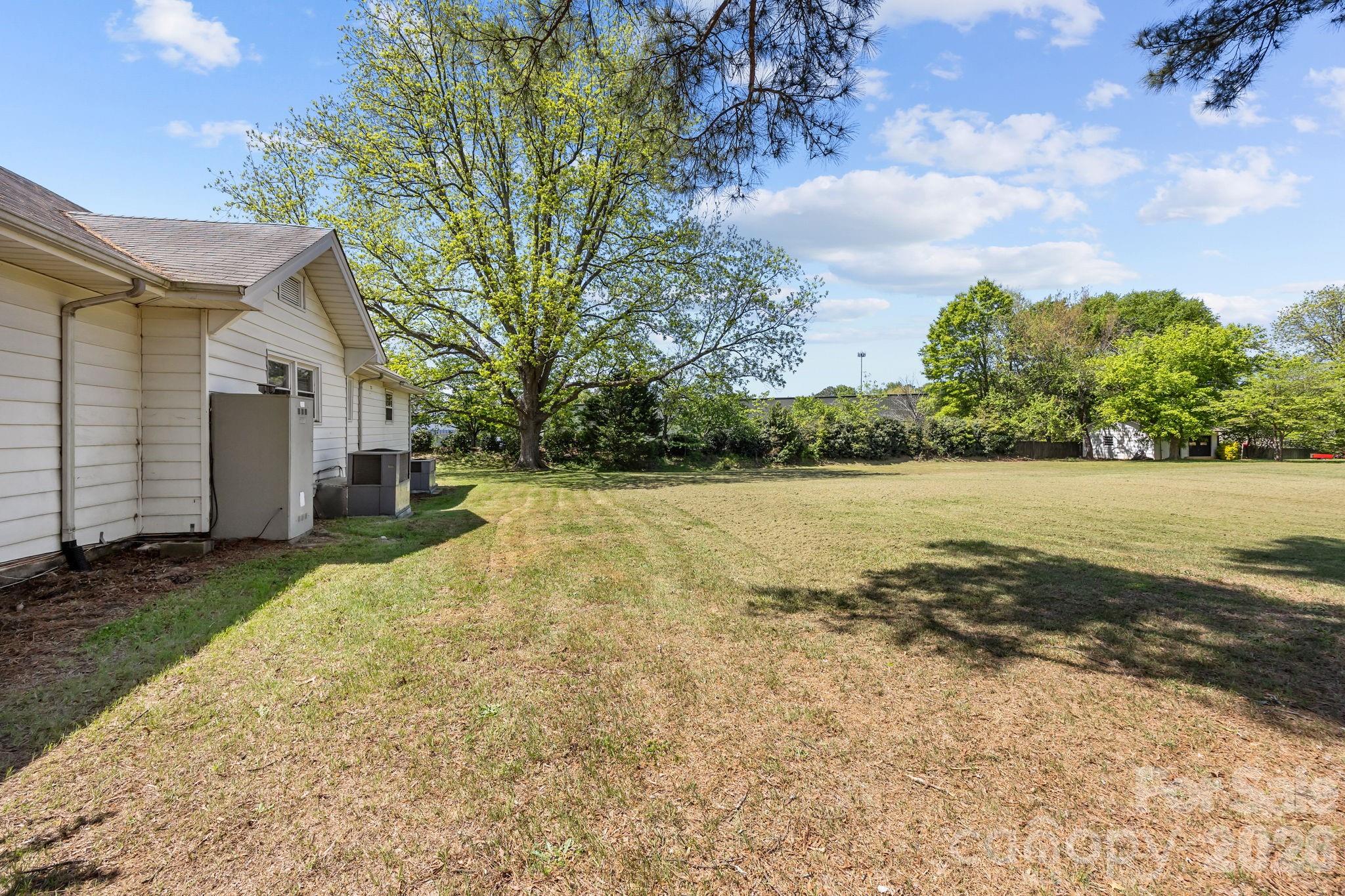 1311 Jenkins Road Gastonia, NC 28052 - Photo 46 of 47 a view of a house with a yard