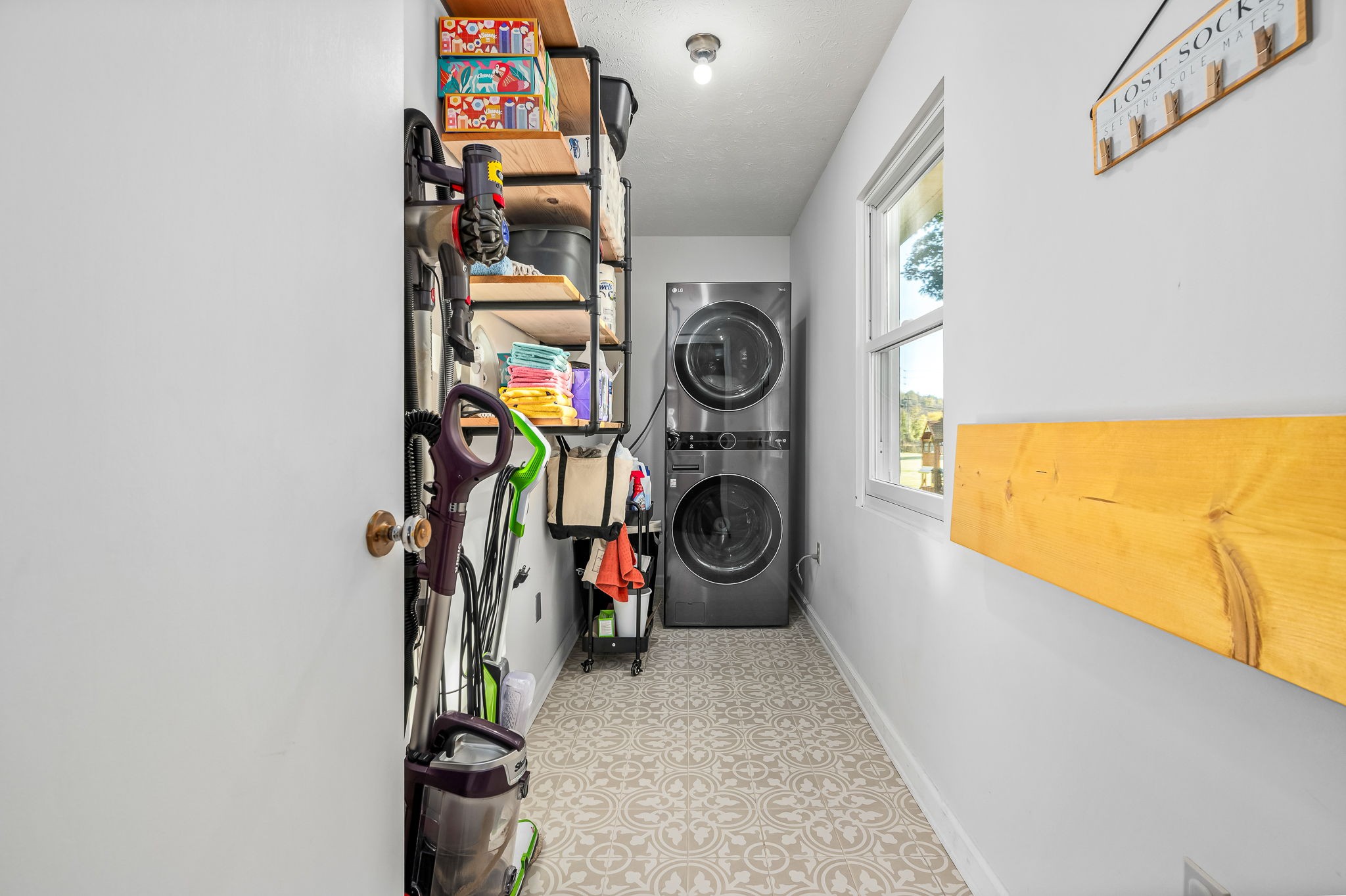 109 Higgins Road Woodbury, TN 37190 - Photo 33 of 49 The laundry room. Washer & dryer are only 1 year old and they do convey with the sale!