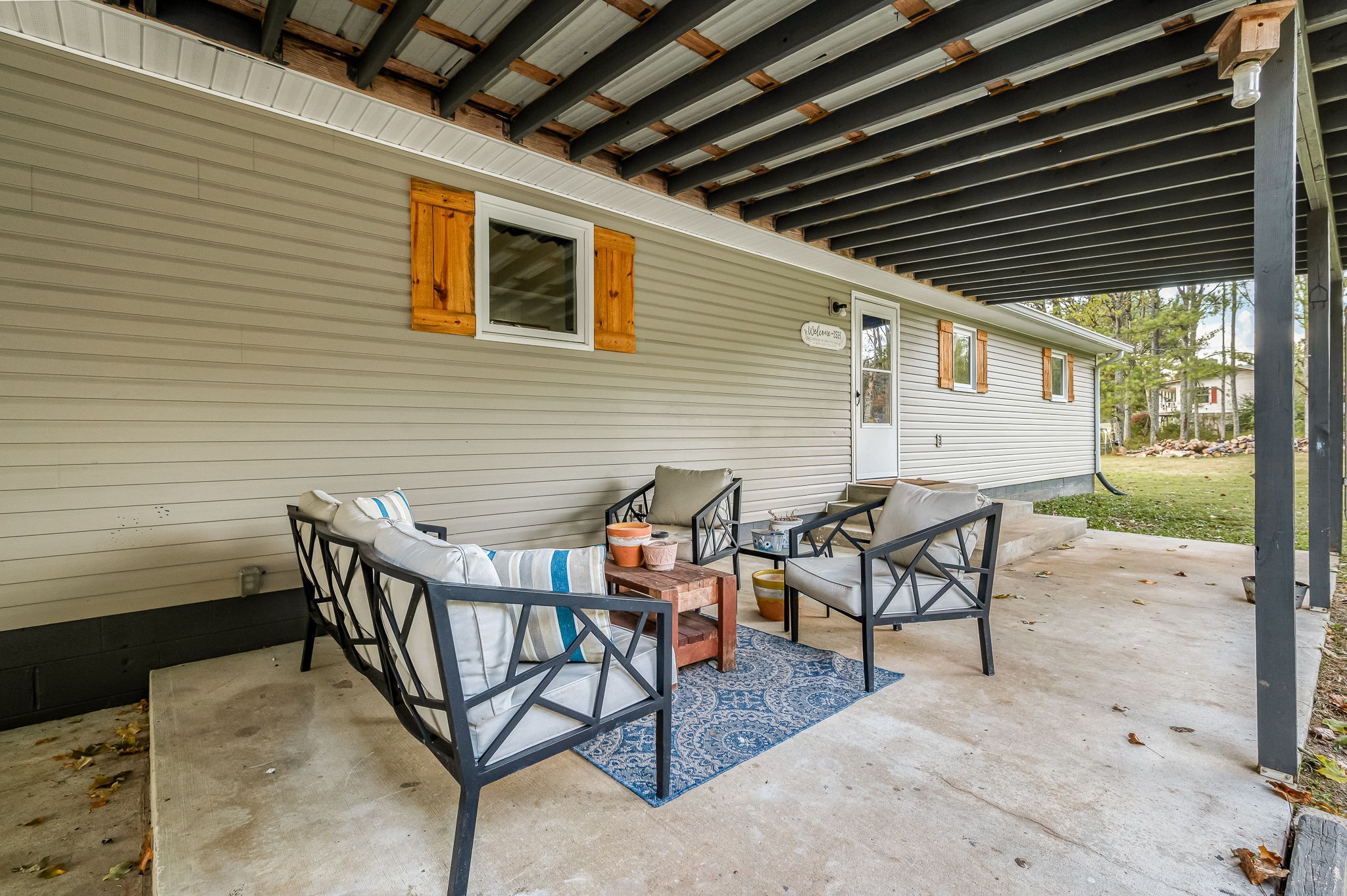 109 Higgins Road Woodbury, TN 37190 - Photo 35 of 49 Another look at the large covered back patio... such a great space.
