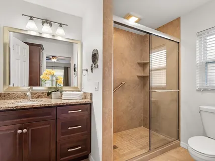 a view of a swimming pool with a yard