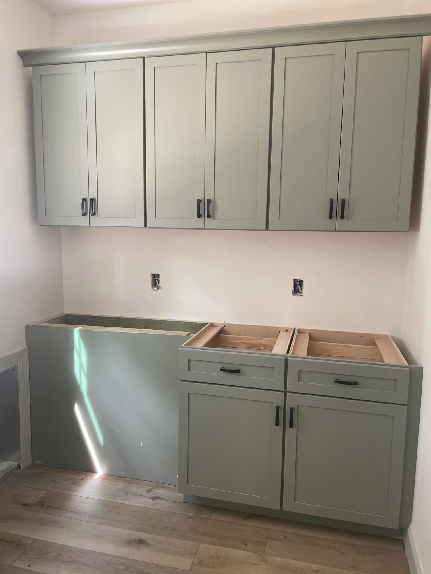 420 North Ridge Street Southern Pines, NC 28387 - Photo 4 of 9 Custom painted laundry room cabinets