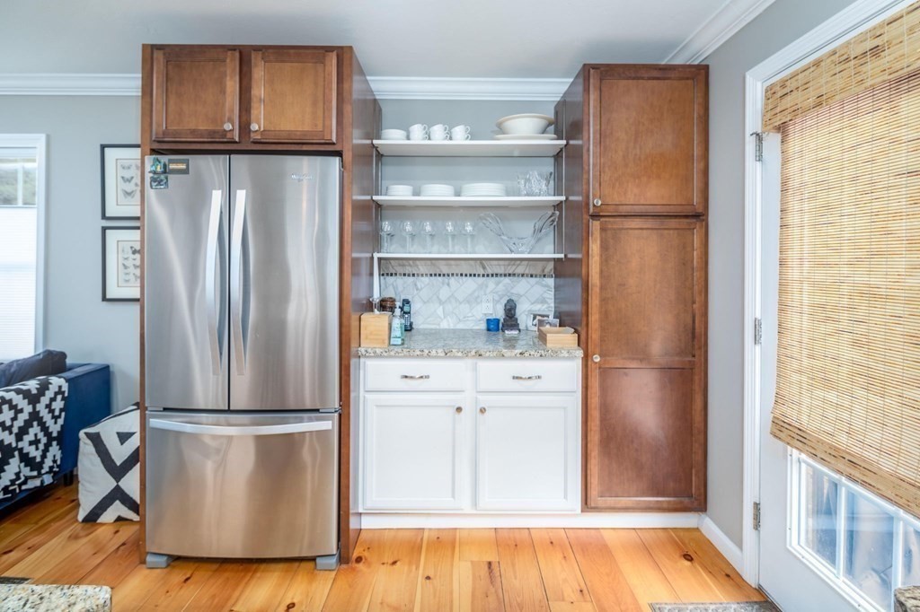8 Collette Road Sturbridge, MA 01518 - Photo 8 of 28 a kitchen with refrigerator a stove and a cabinets