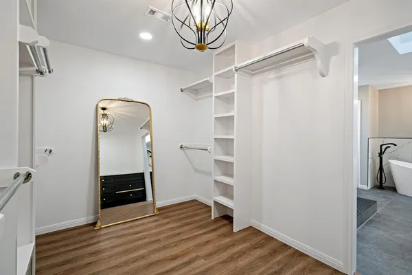 a view of a walk in closet