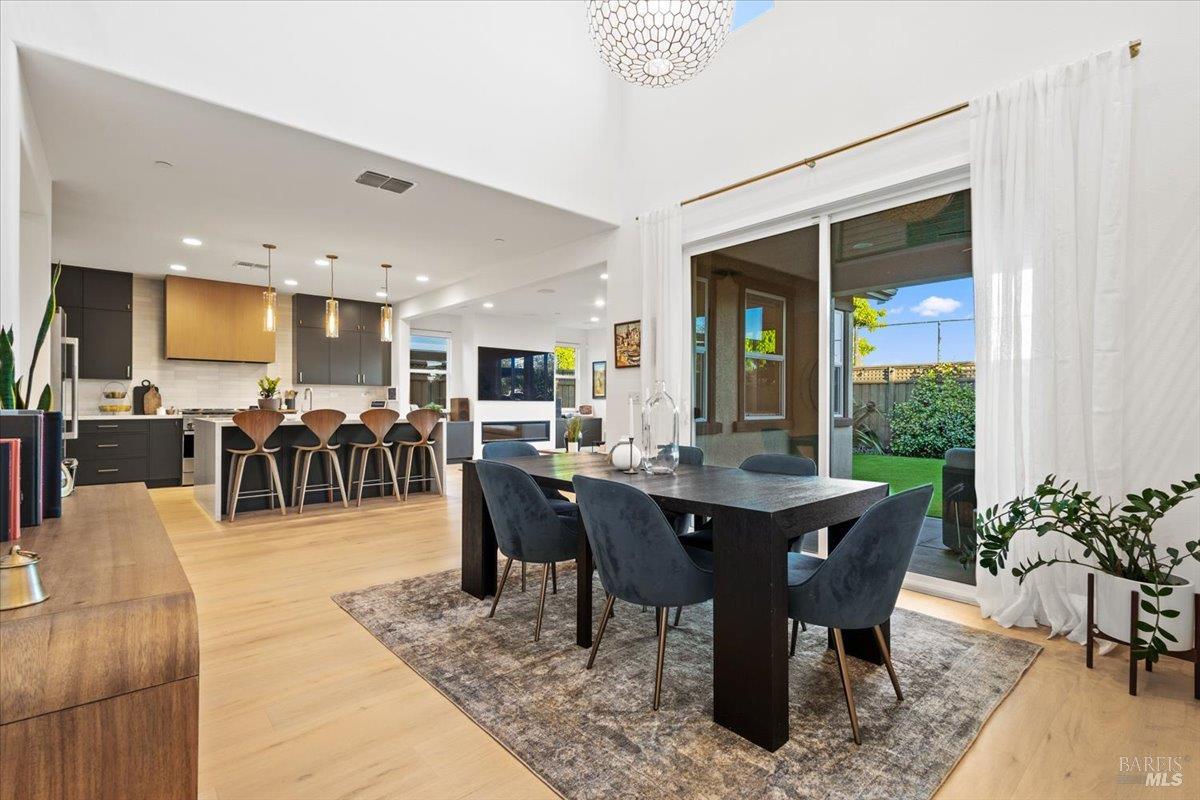 1469 Oak Circle Rohnert Park, CA 94928 - Photo 17 of 42 Indoor-Outdoor Entertaining Made Easy Large sliding glass doors connect the dining space directly to the covered patio and outdoor living areas, creating effortless flow for gatherings both large and small.