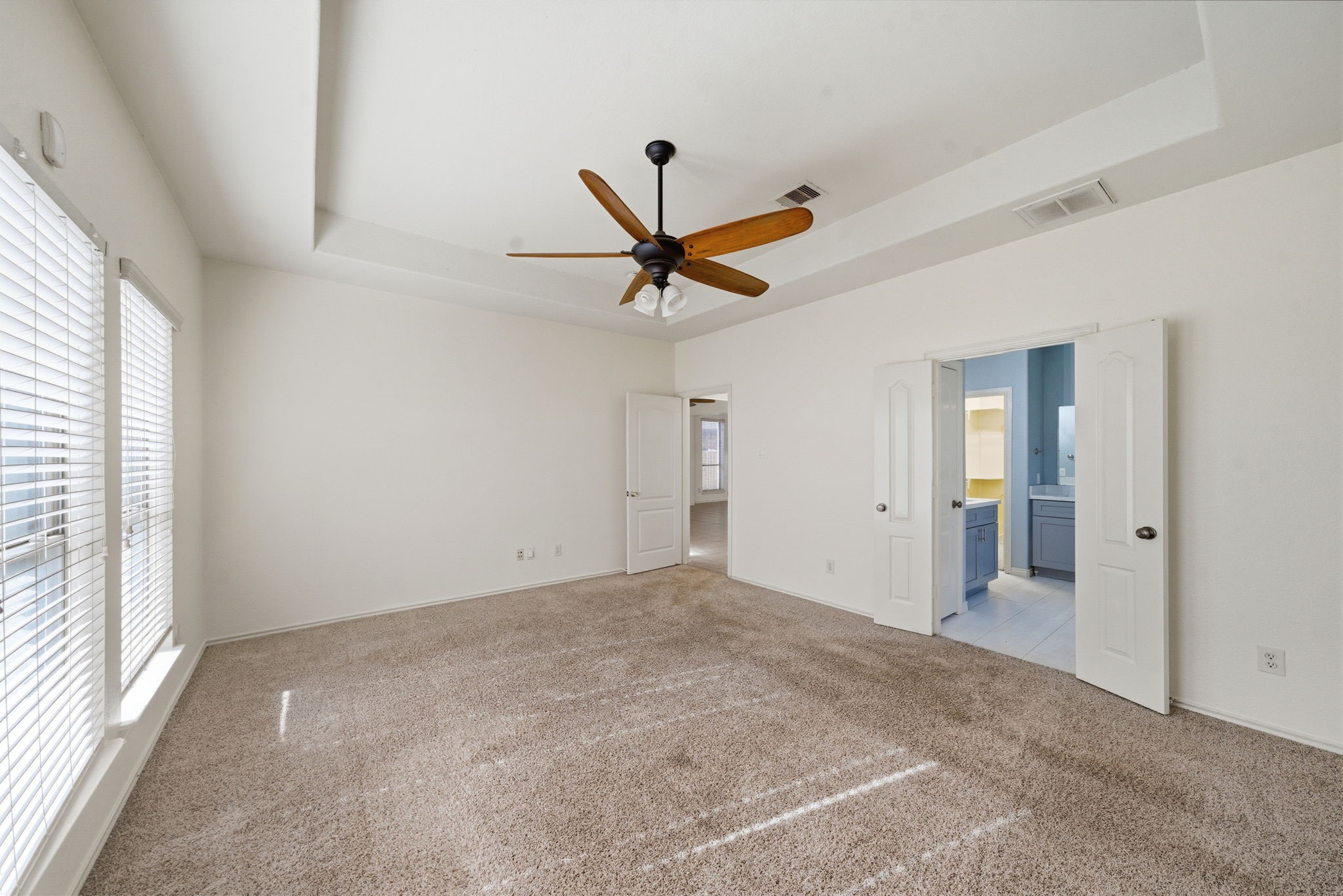23139 Tranquil Spring Lane Katy, TX 77494 - Photo 11 of 22 a view of a room with a ceiling fan and window