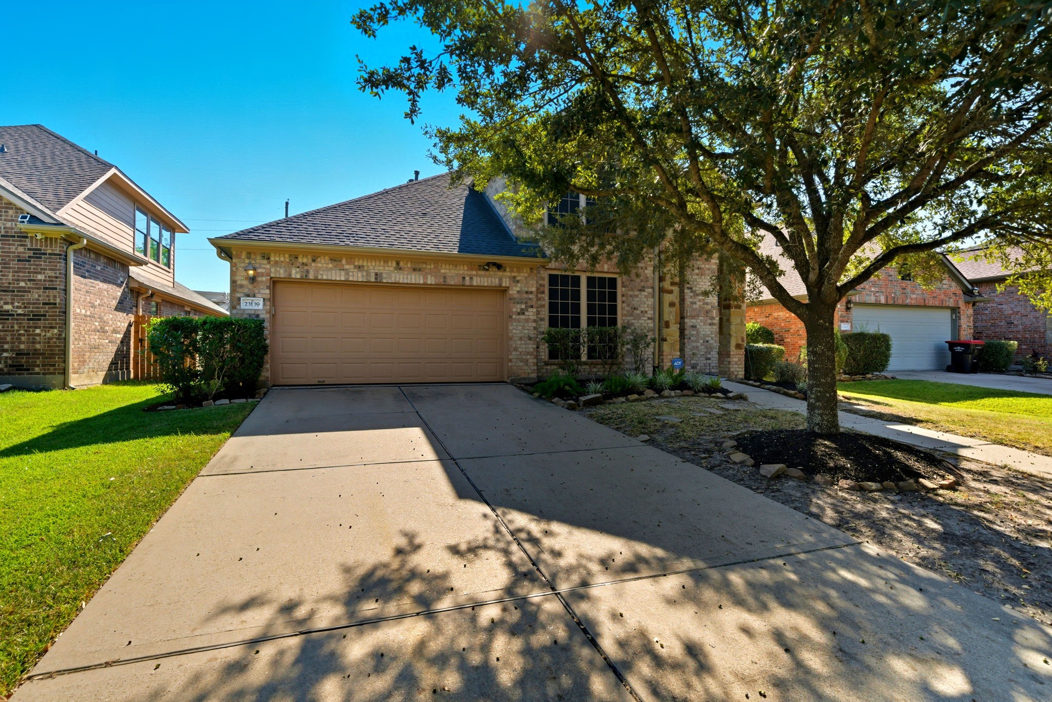 23139 Tranquil Spring Lane Katy, TX 77494 - Photo 2 of 22 a view of a house with a yard
