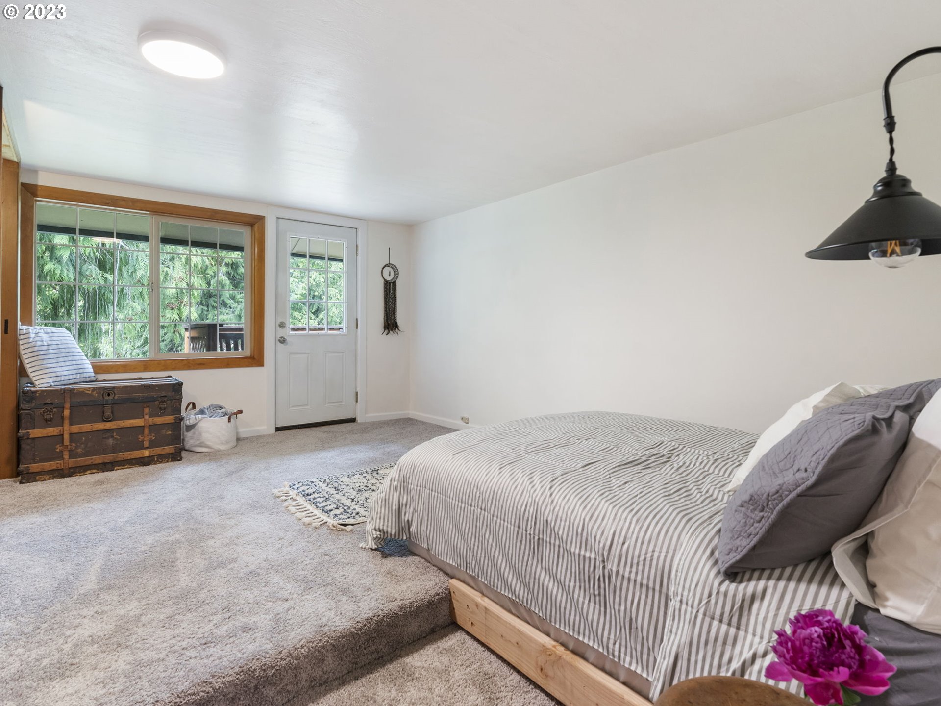 26271 South Habelt Road Estacada, OR 97023 - Photo 15 of 32 a bed room with a bed and a chair
