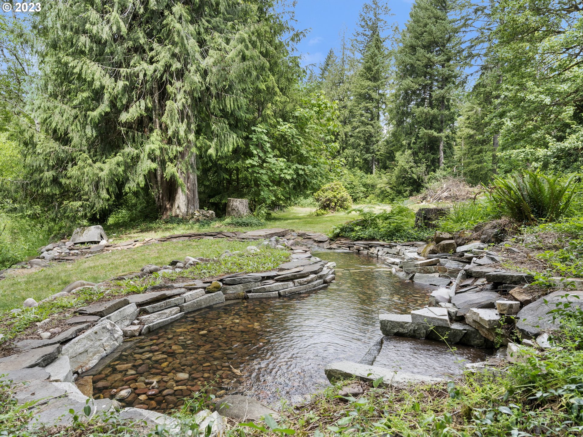 26271 South Habelt Road Estacada, OR 97023 - Photo 29 of 32 a view of a lake with lots of trees