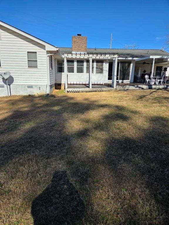 2944 Gravel Springs Road Buford, GA 30519 - Photo 2 of 10 a front view of a house with a yard