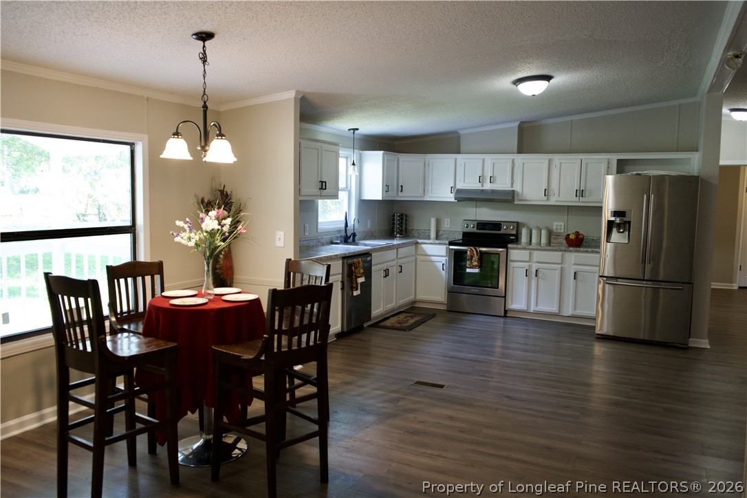 212 Grummen Road Hope Mills, NC 28348 - Photo 5 of 37 Kitchen view from master bedroom