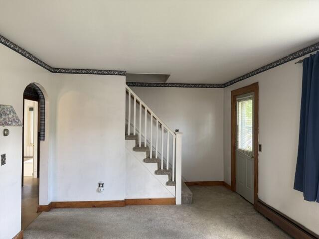 45 Cushman Road Winslow, ME 04901 - Photo 6 of 29 Living room view of stairs to level two