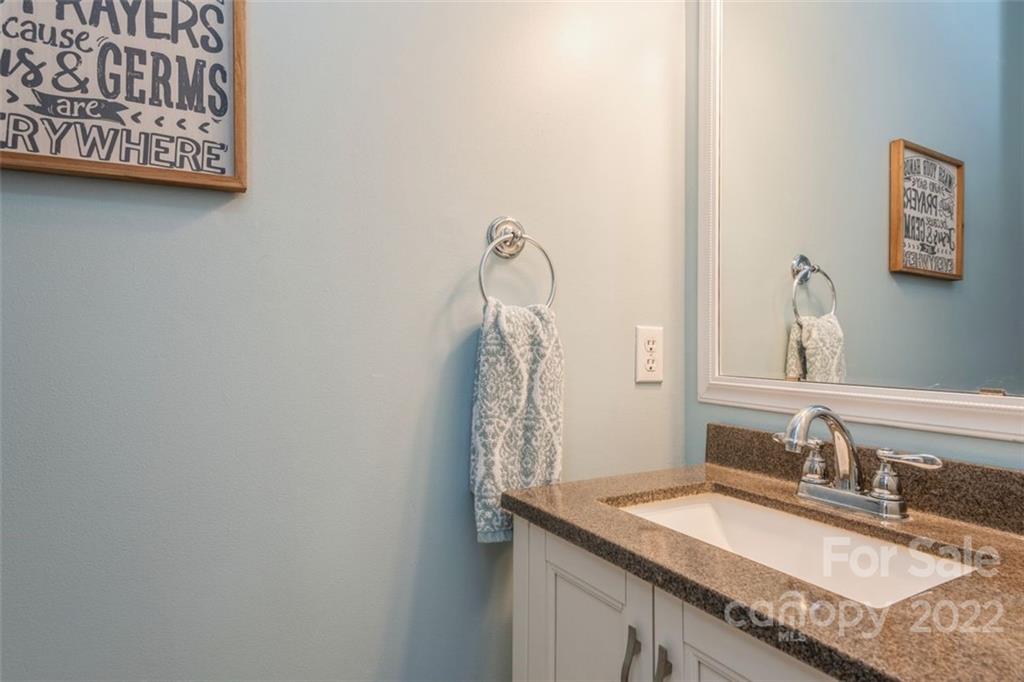 739 West Cheval Drive Fort Mill, SC 29708 - Photo 12 of 36 a bathroom with a granite countertop sink and a mirror