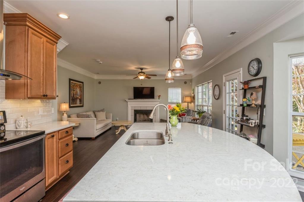 739 West Cheval Drive Fort Mill, SC 29708 - Photo 21 of 36 a large kitchen with a large counter space a sink stainless steel appliances and cabinets