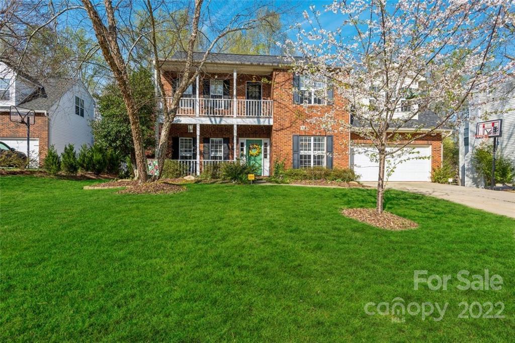 739 West Cheval Drive Fort Mill, SC 29708 - Photo 3 of 36 a front view of a building with a yard