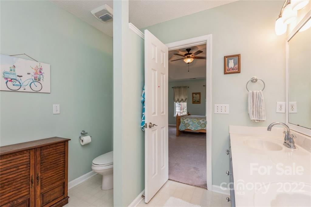 739 West Cheval Drive Fort Mill, SC 29708 - Photo 35 of 36 a bathroom with a sink a toilet and shower
