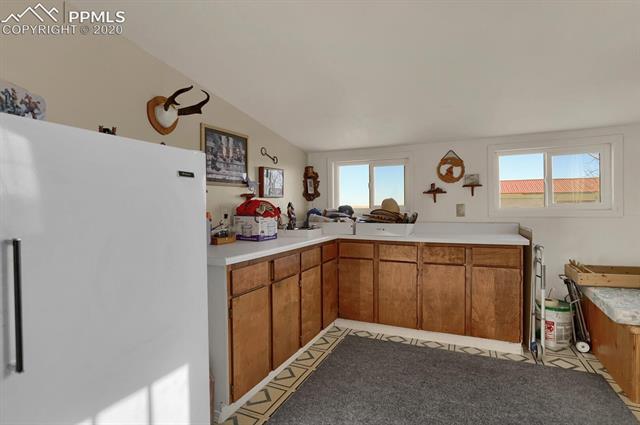4685 South Yoder Road Yoder, CO 80864 - Photo 22 of 32 Mud Room and rear entrance.