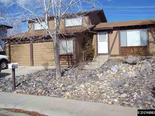 1835 Becky Court Reno, NV 89503 - Photo 1 of 4 a front view of a house with a yard