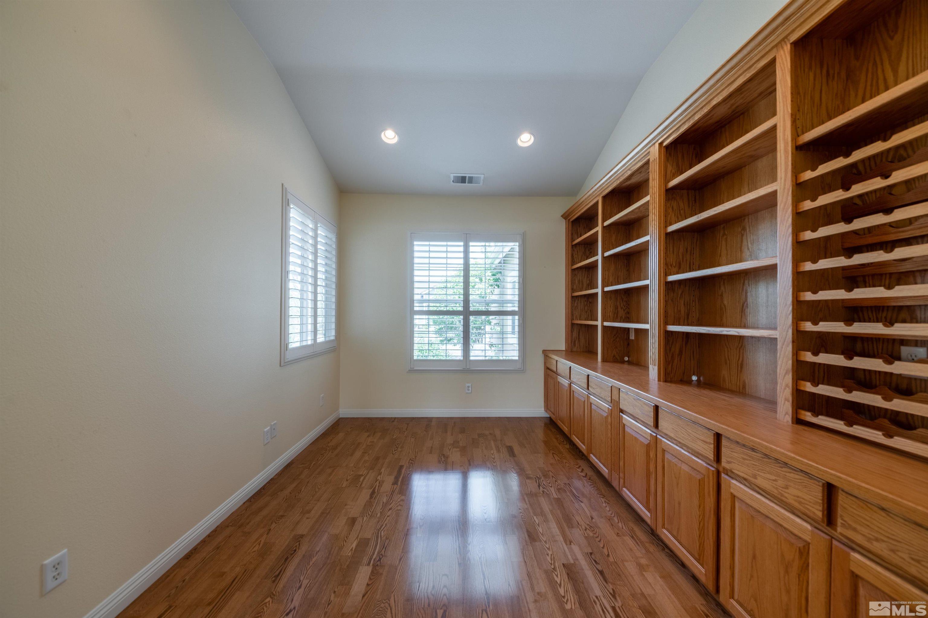 1416 Wild Wolf Way Reno, NV 89521 - Photo 11 of 39 a view of wooden floor and windows in a room