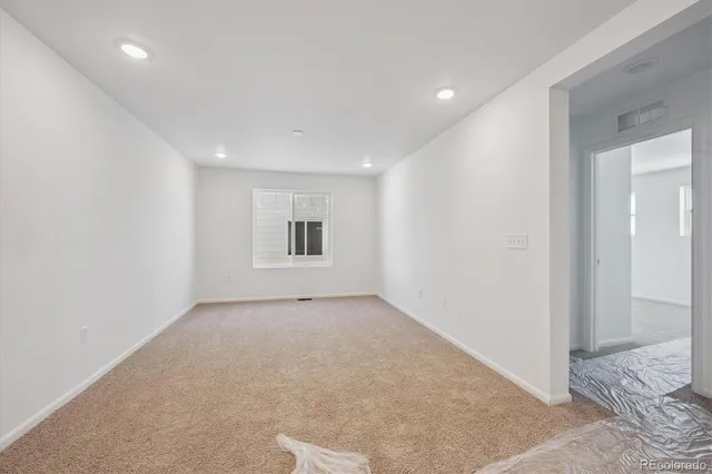 en empty room with windows