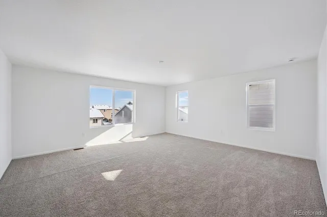 a view of empty room with a window