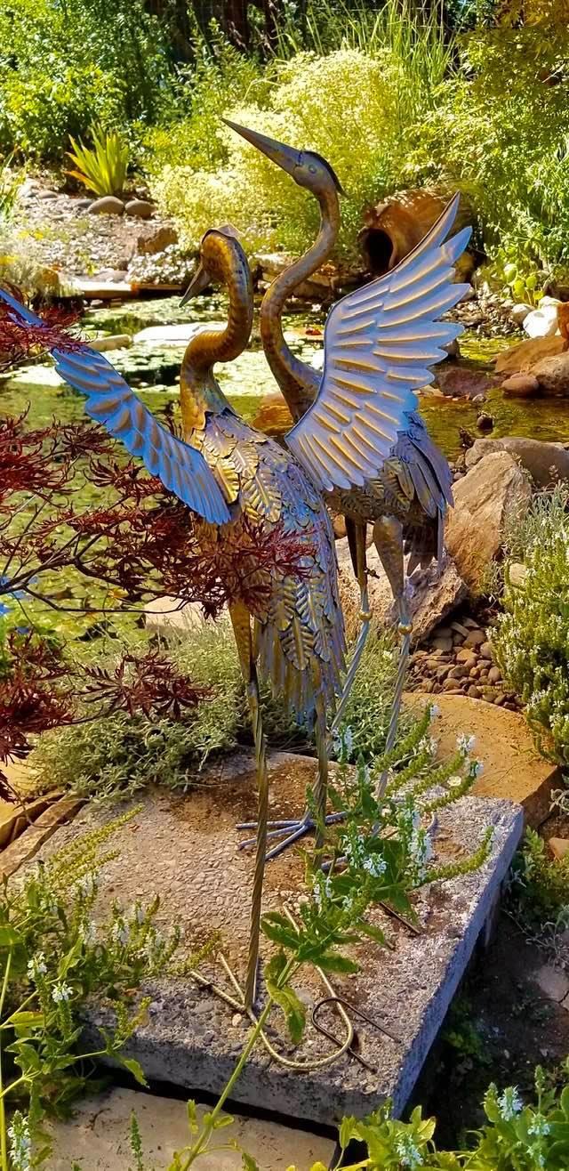5196 Pioneer Road Medford, OR 97501 - Photo 43 of 94 These metal sculptures have replaced the statue at the pond.