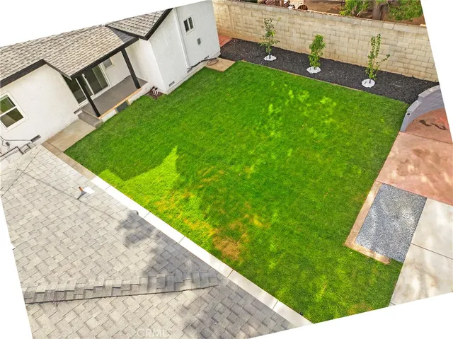 a view of backyard with outdoor space