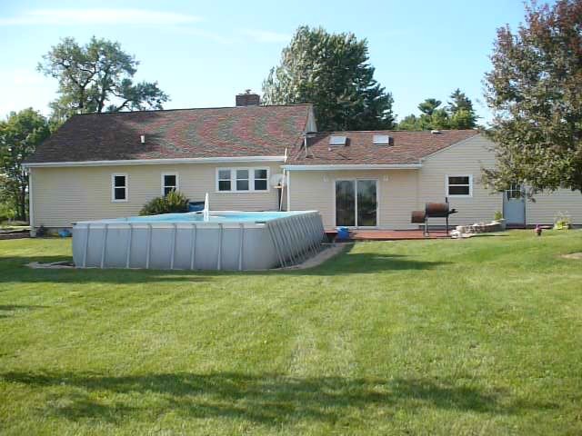 2303 Beach Road Ashton, IL 61006 - Photo 14 of 20 a view of a house with a yard and sitting area