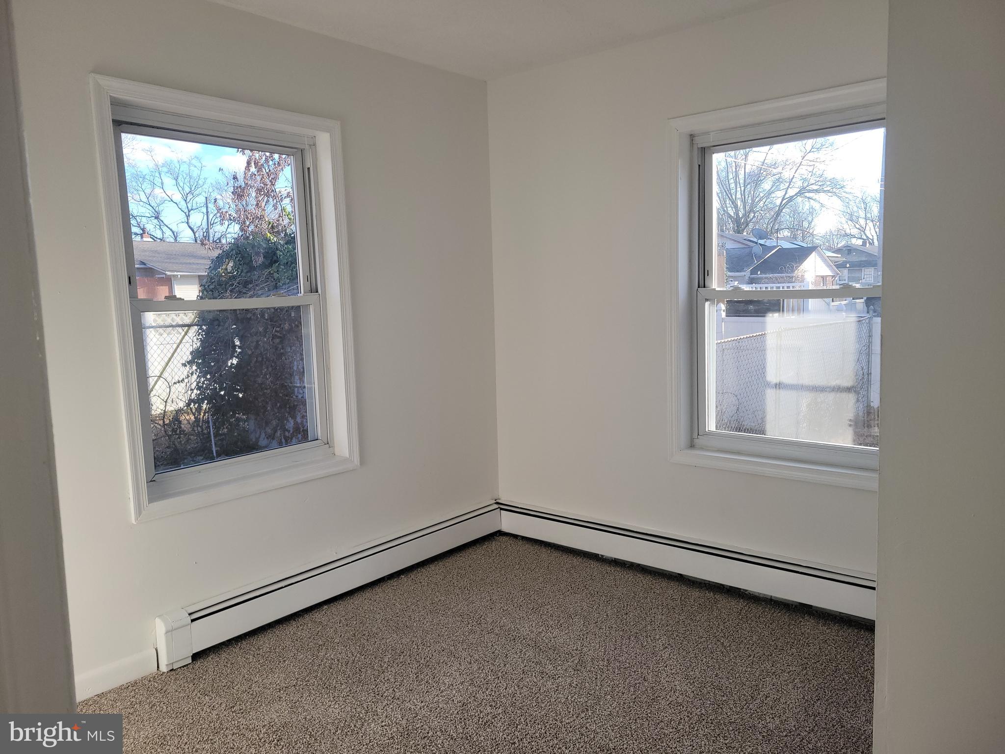 239 J Street Carneys Point, NJ 08069 - Photo 14 of 19 an empty room with a window