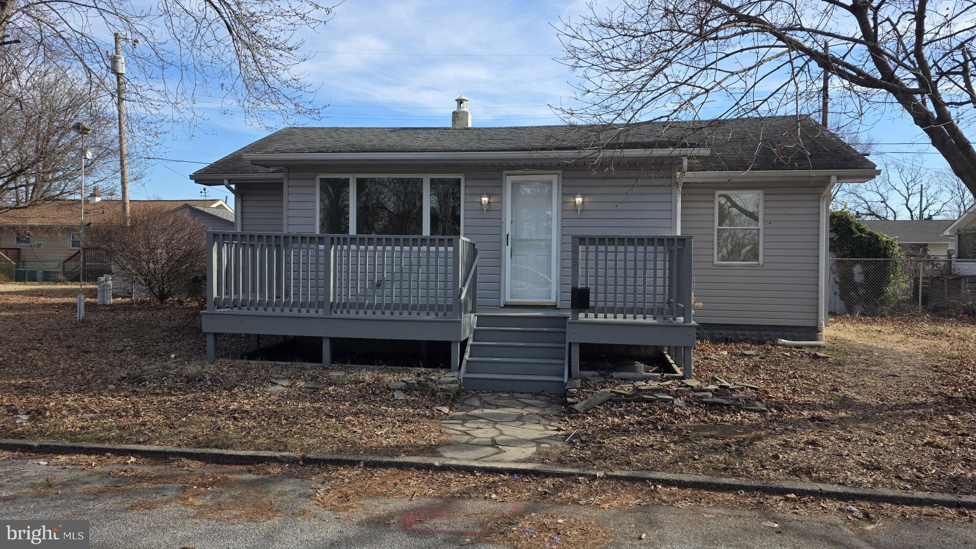 239 J Street Carneys Point, NJ 08069 - Photo 19 of 19 a front view of a house with garden