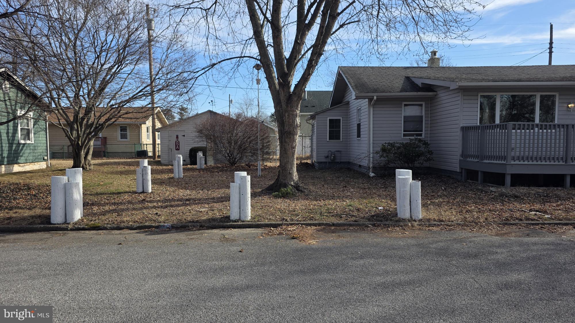 239 J Street Carneys Point, NJ 08069 - Photo 3 of 19 a front view of a house with garden