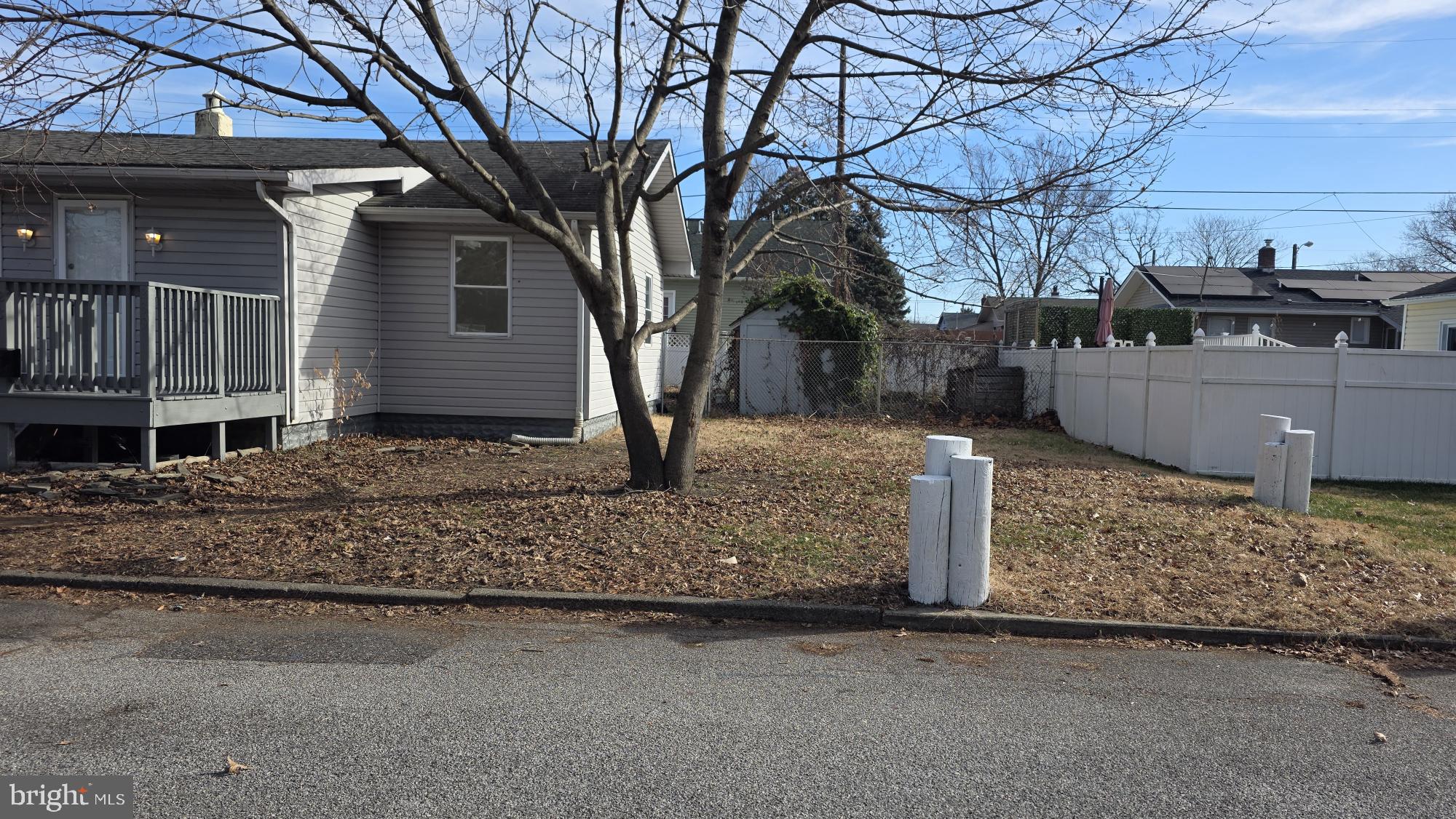 239 J Street Carneys Point, NJ 08069 - Photo 4 of 19 a front view of a house with garden