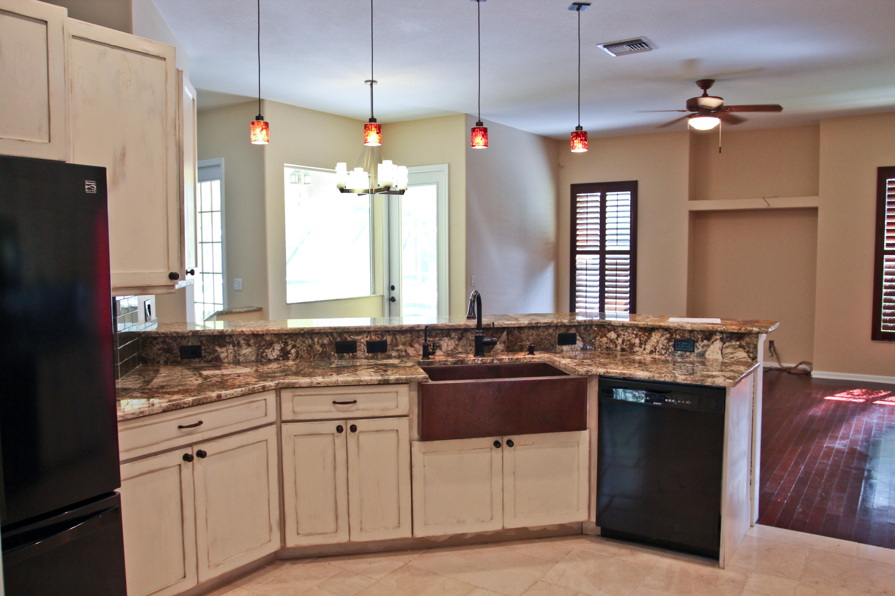 16028 Randolph Siding Road Jupiter, FL 33478 - Photo 13 of 69 Open kitchen with granite countertop