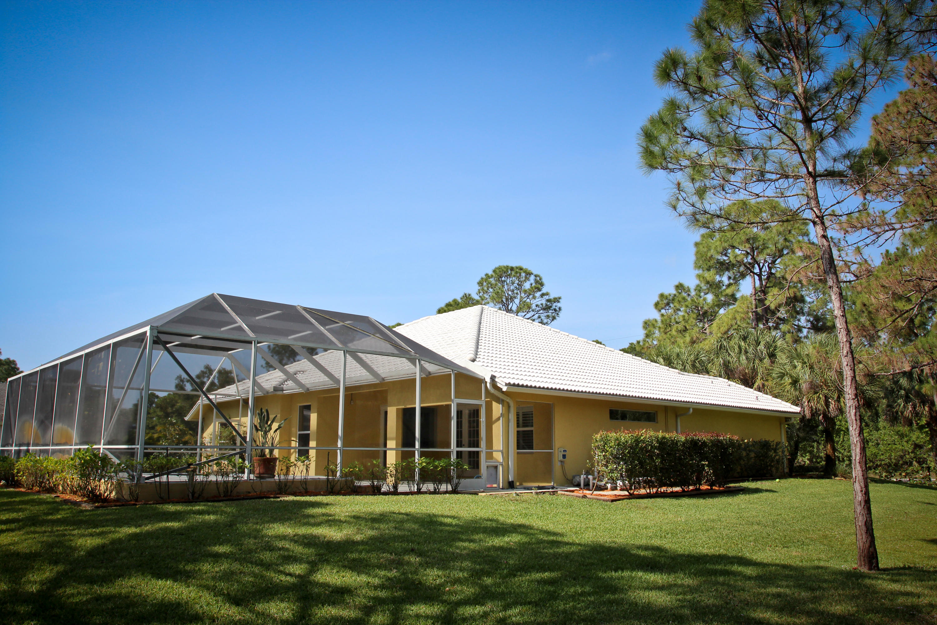 16028 Randolph Siding Road Jupiter, FL 33478 - Photo 5 of 69 Back exterior 2