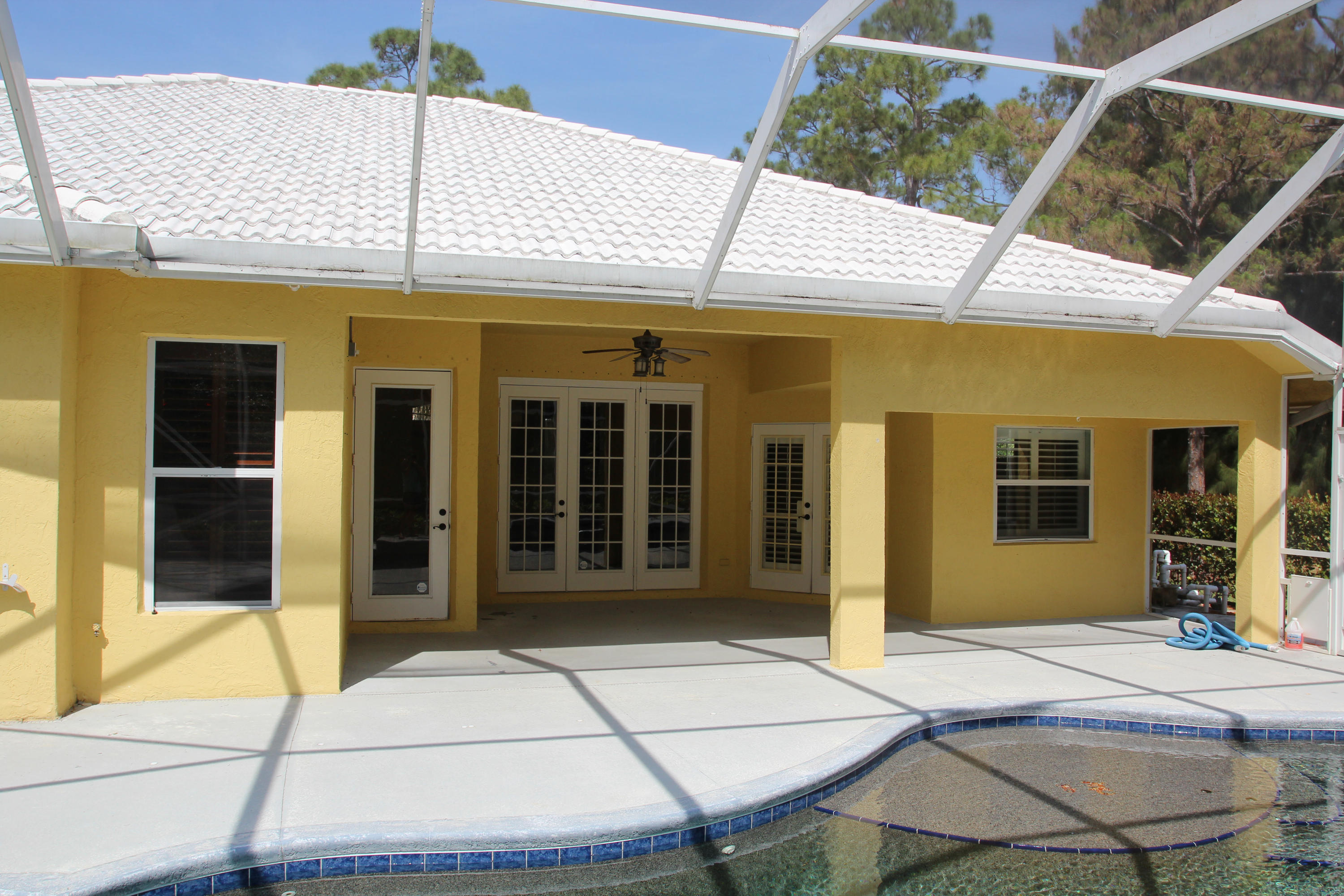 16028 Randolph Siding Road Jupiter, FL 33478 - Photo 59 of 69 Screened pool, patio & lanai