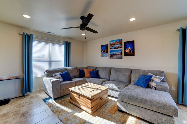 3853 South Red Valley Circle, Unit 22A1 Moab, UT 84532 - Photo 8 of 28 Living room with a ceiling fan and recessed lighting