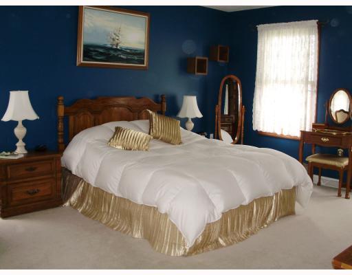 137 Liberty Road Harmony, PA 16037 - Photo 12 of 18 Master Bedroom. 17 x 13 Master Suite; Newer Wall to Wall Carpet; Large walk in closet in bath area; dual sinks, jet spray tub, shower stall and private commode room. Three bedrooms and stairs and hall have quality, newer wall to wall carpet.