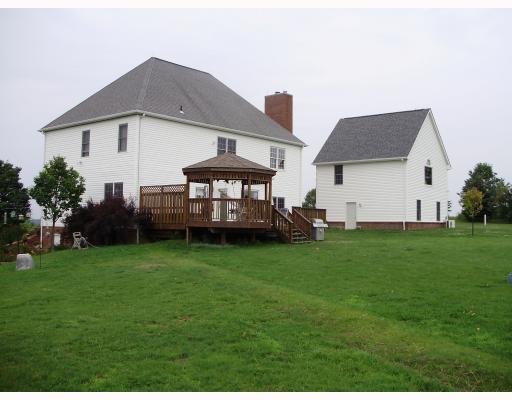 137 Liberty Road Harmony, PA 16037 - Photo 16 of 18 Patio/Deck. TREX and Cedar deck; 12 Gazebo; 5 person hot tub; side entrance to basement; Studio structure.