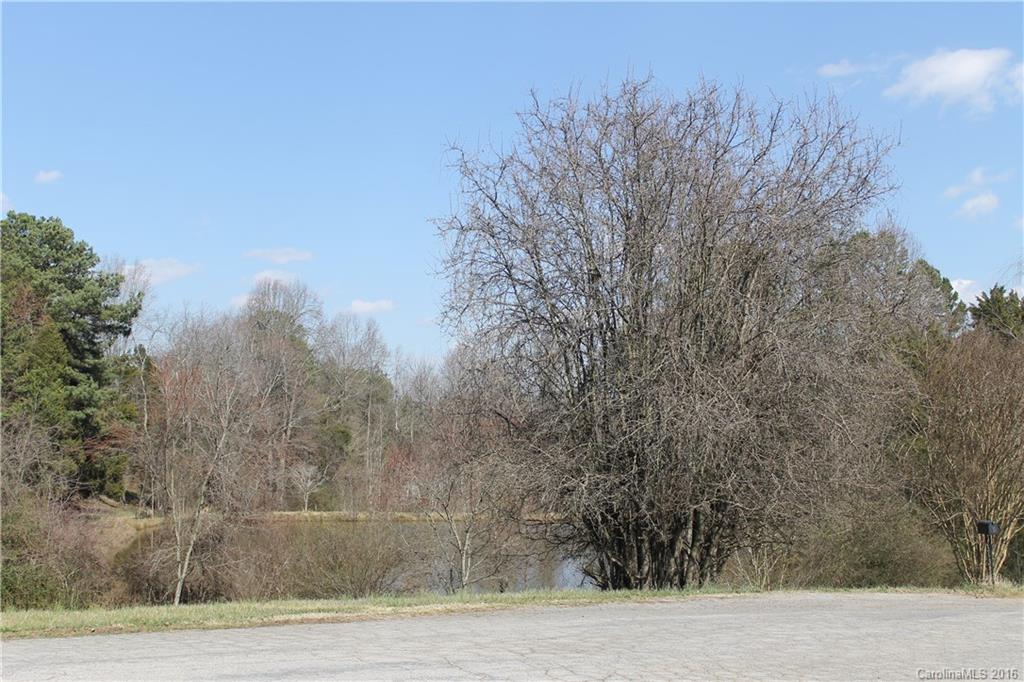 4 Old Farm Road Salisbury, NC 28147 - Photo 2 of 2 a view of a dry yard with trees