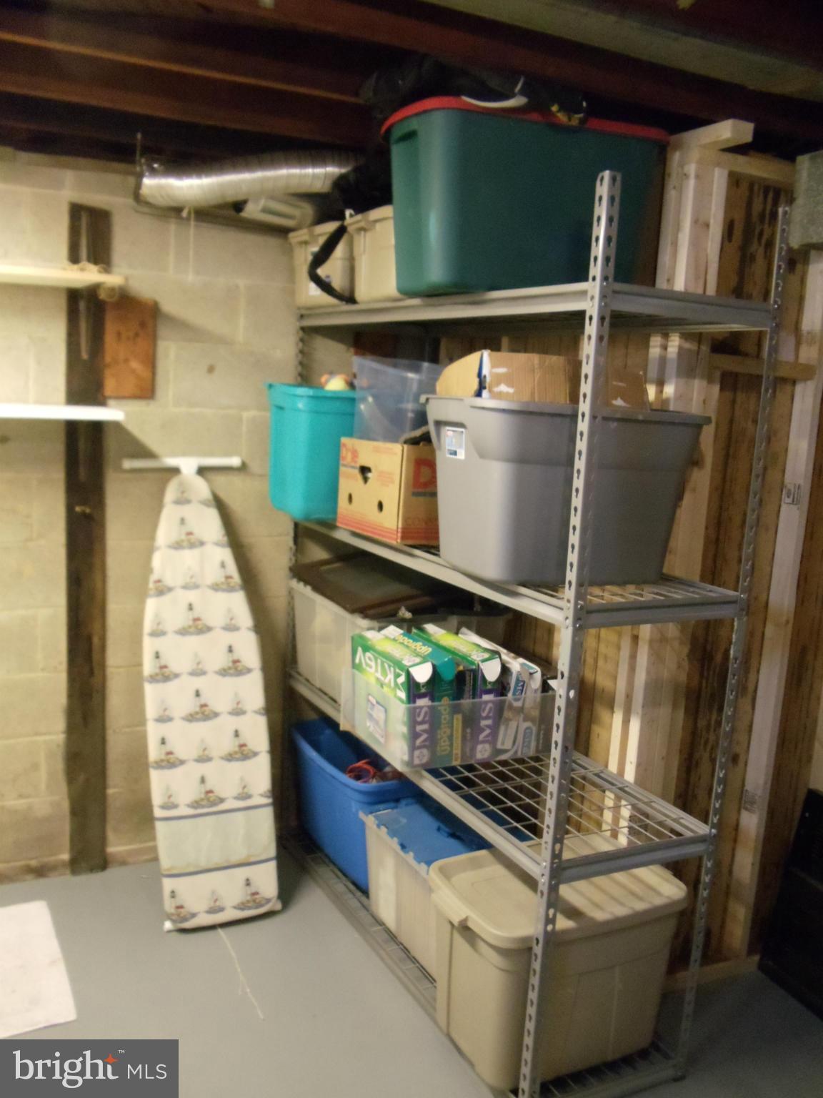 8222 Highpoint Road Clearwater Beach, MD 21226 - Photo 16 of 22 Basement has plenty of storage