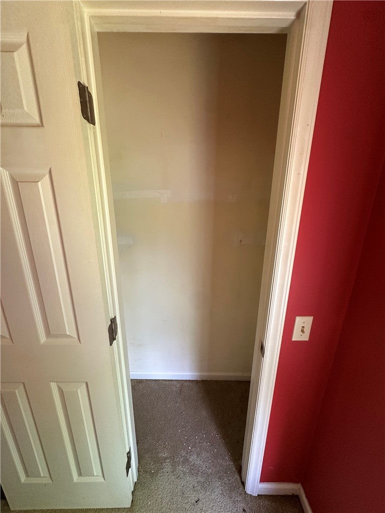 138 Cloverdale Road Seneca, SC 29678 - Photo 12 of 27 A deep, carpeted closet provides convenient storage space.