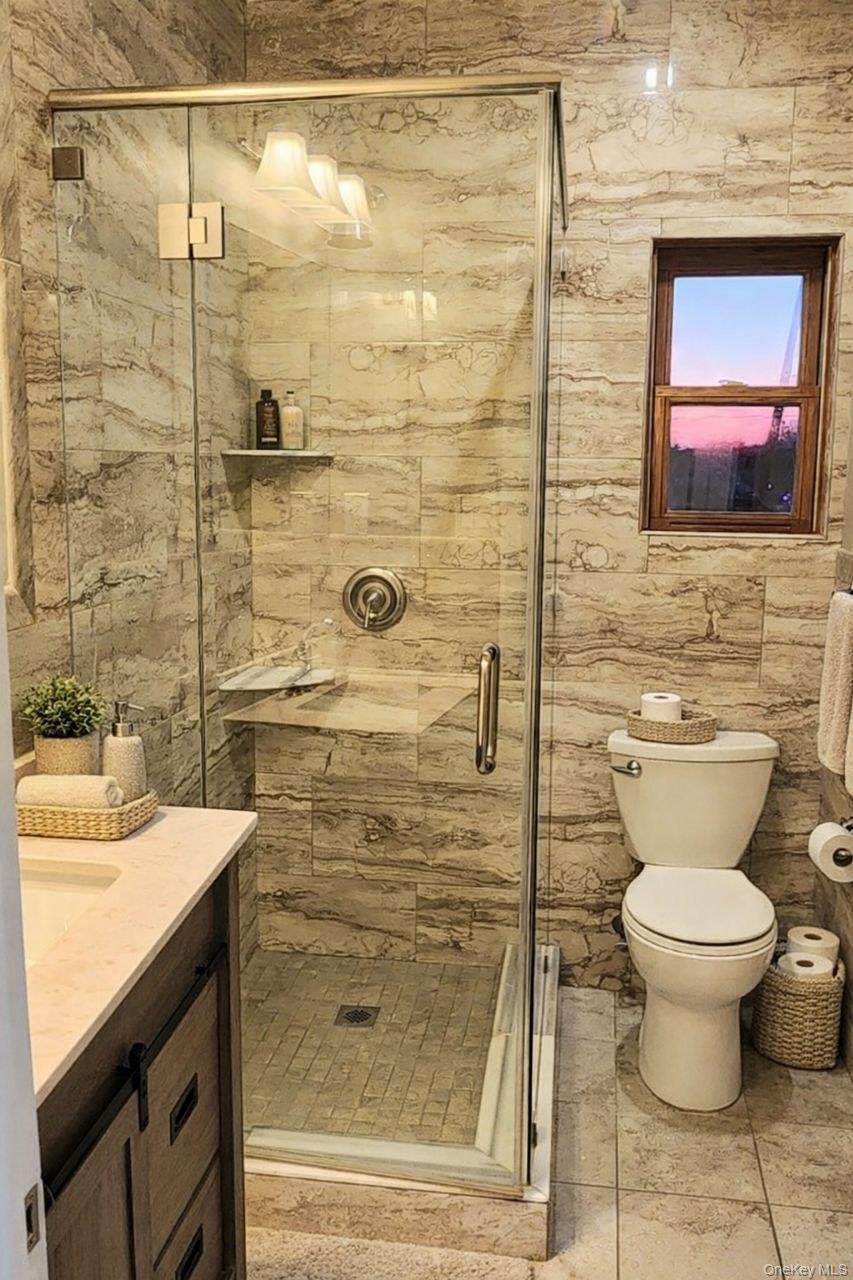 25 Allard Avenue New Rochelle, NY 10805 - Photo 8 of 8 a bathroom with a toilet and a sink