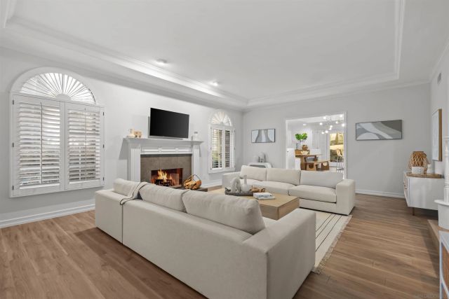 a kitchen with a sink a stove and cabinets