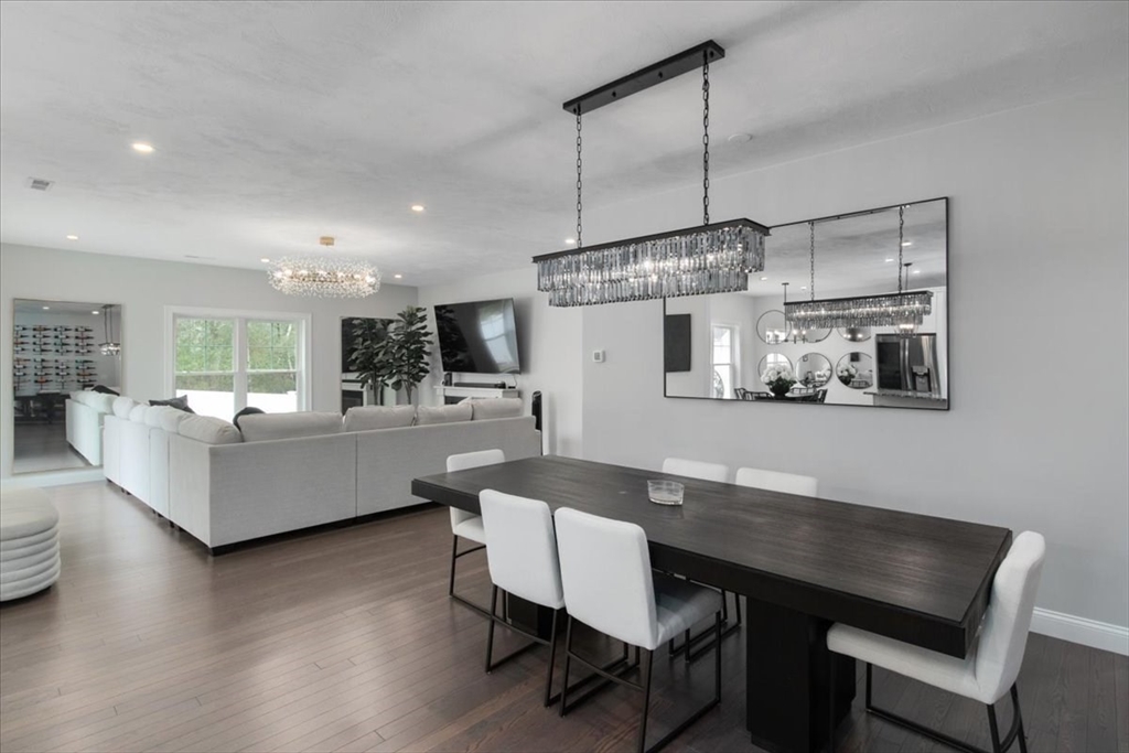 9 Iris Lane Bellingham, MA 02019 - Photo 11 of 34 a living room with furniture and wooden floor