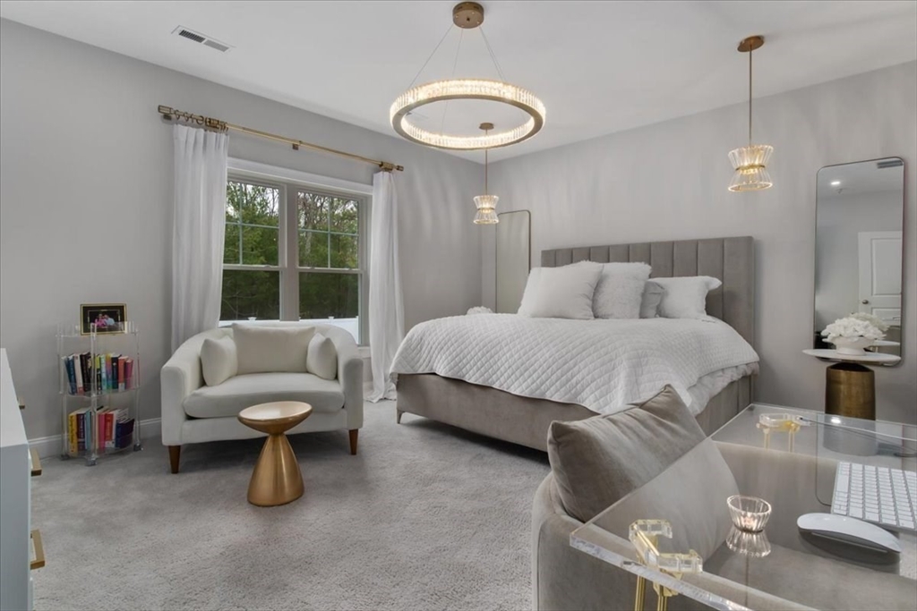 9 Iris Lane Bellingham, MA 02019 - Photo 15 of 34 a bedroom with a bed and a couch