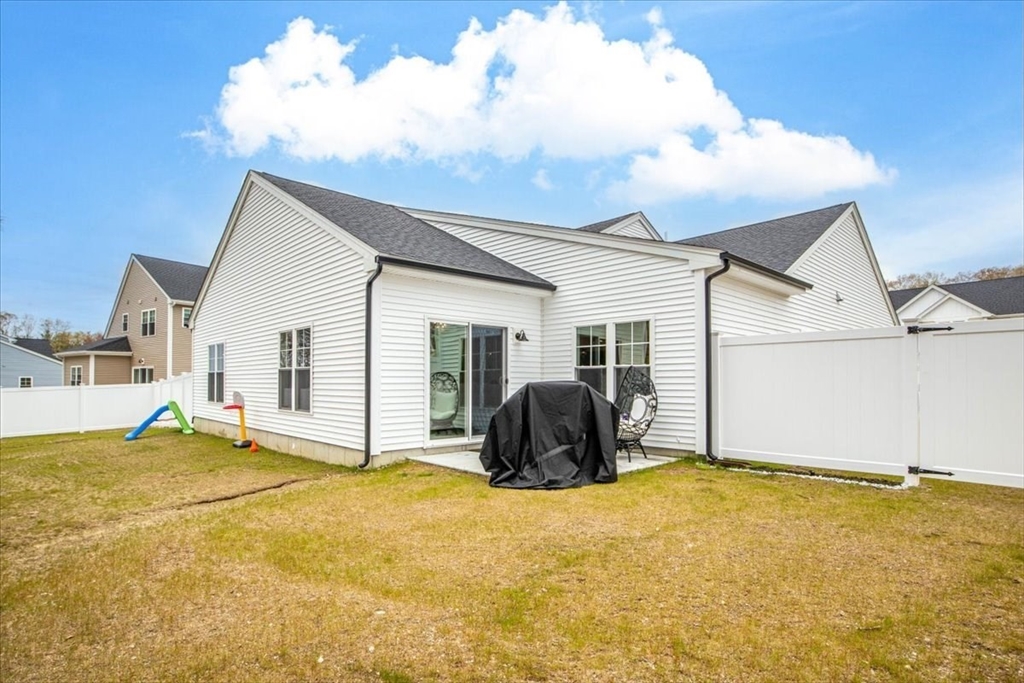 9 Iris Lane Bellingham, MA 02019 - Photo 30 of 34 a view of a house with backyard and sitting area